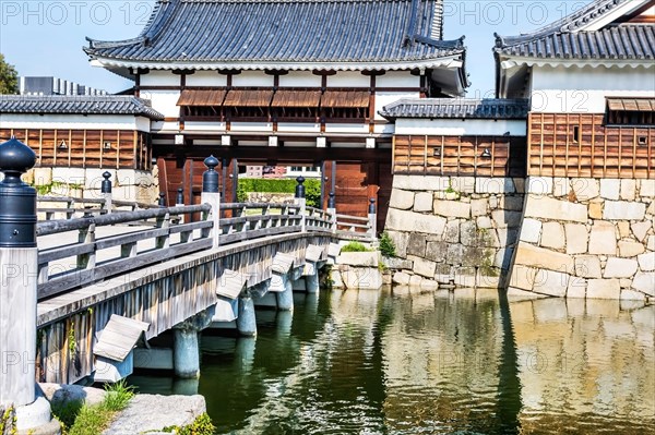 Exterior view of ancient Hiroshima palace behind mote of water in Hiroshima, Japan, Asia