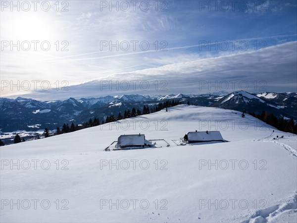 Winter atmosphere, snow-covered landscape, snow-covered alpine peaks, alpine huts on the Schafbergalm, near St. Wolfgang am Wolfgangsee, Salzkammergut, Upper Austria, Austria, Europe