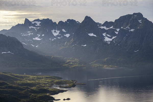 Fjord Raftsund and mountains in atmospheric evening light, view from the summit of Dronningsvarden or Stortinden, Vesteralen, Norway, Europe