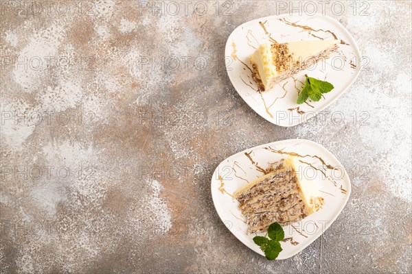 Walnut and almond cake on brown concrete background. top view, flat lay, copy space