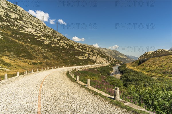 Gotthard Pass, mountain landscape and old pass road with cobblestones, Canton Ticino, Switzerland, Europe