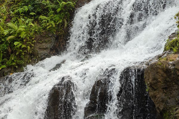 Uma Anyar waterfall, Bali island, Ubud, Indonesia. Jungle, tropical forest, daytime with cloudy sky