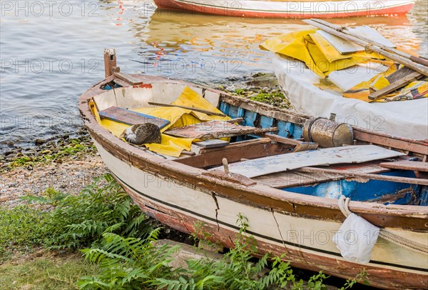 Derelict wood boat in dry dock at harbor in Istanbul, Tuerkiye