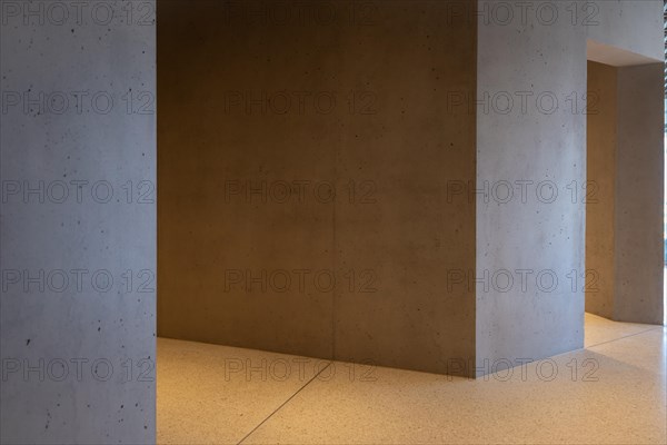 Modern Illuminated Concrete Corridor in a Sunny Day in Switzerland