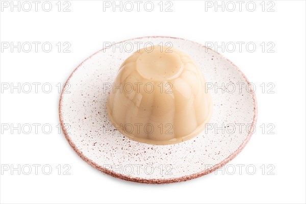 Buckwheat milk jelly isolated on white background. side view
