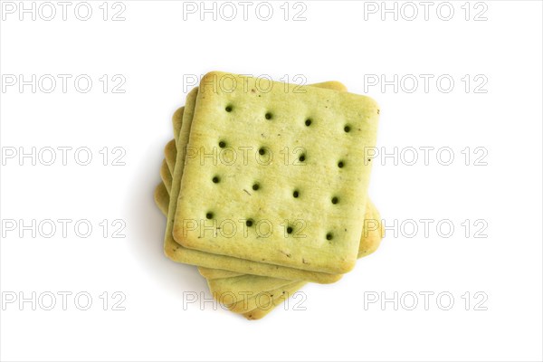 Green cracker pile isolated on white background. top view, flat lay, close up