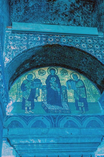 Virgin Mary holding the Christ Child inside Hagia Sophia Mosque. Noise or grain included in Istanbul, Turkiye