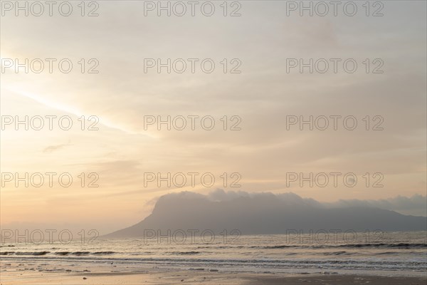 Bako national park, sea sandy beach, overcast, cloudy sunset, sky and sea, low tide. Vacation, travel, tropics concept, no people, Malaysia, Kuching, Asia