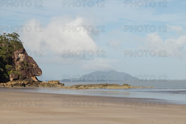 Cliff in Bako national park, sunny day, blue sky and sea. Vacation, travel, tropics concept, no people, Malaysia, Kuching, Asia