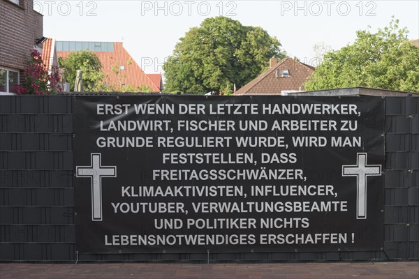 Protest poster in Greetsiel, Germany, Europe