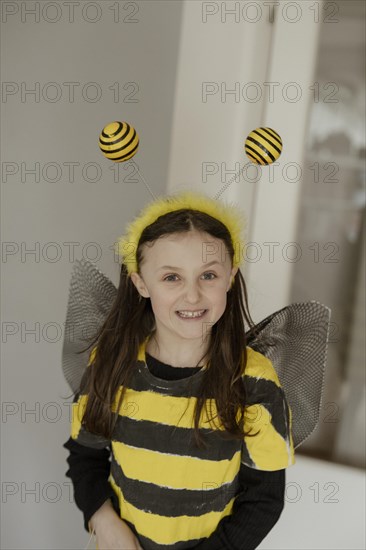 Girl in a bee costume