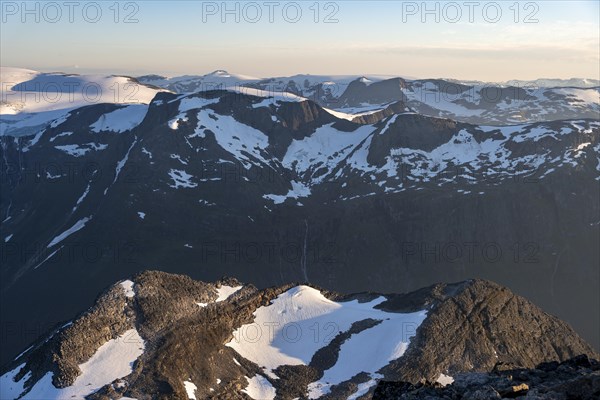 Mountain peak with Jostedalsbreen glacier in the evening light, view from the summit of Skala, Loen, Norway, Europe