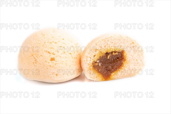 Japanese rice sweet buns mochi filled with jam isolated on white background. side view, close up