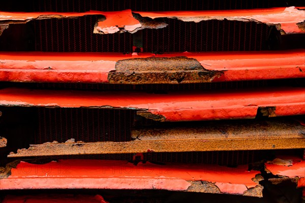 Rusty red lorry radiator, abandoned herring factory Djupavik, Reykjarfjoerour, Strandir, Arnes, Westfjords, Iceland, Europe