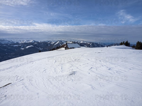 Winter atmosphere, snow-covered landscape, snow-covered alpine peaks, alpine hut on the Schafbergalm, near St. Wolfgang am Wolfgangsee, Salzkammergut, Upper Austria, Austria, Europe