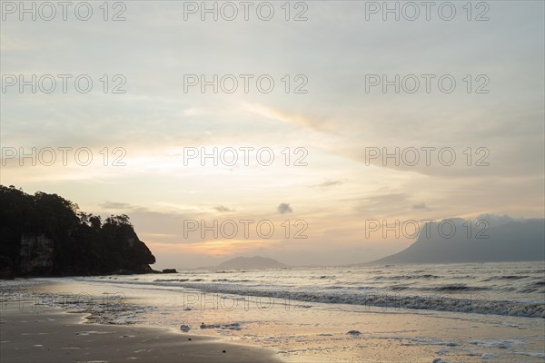 Bako national park, sea sandy beach, overcast, cloudy sunset, sky and sea, low tide. Vacation, travel, tropics concept, no people, Malaysia, Kuching, Asia