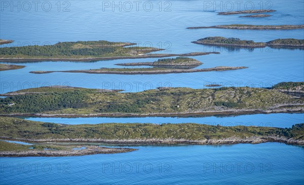 Rocky islands in the blue sea, sea with archipelago islands, Ulvagsundet, Vesteralen, Norway, Europe