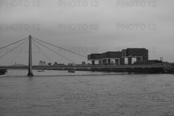 View over the Rhine with crane houses and bridge, black and white, Cologne, Germany, Europe