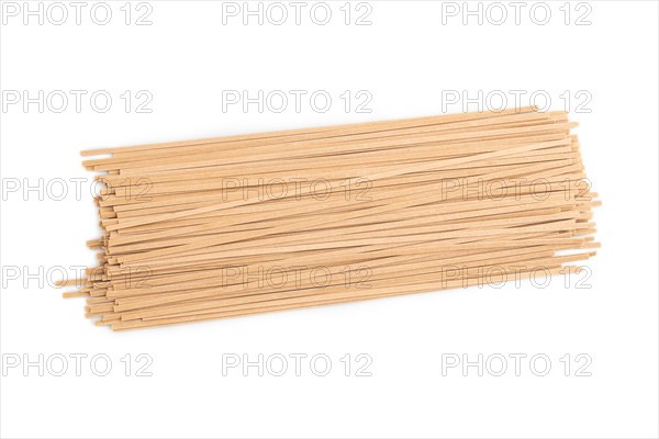 Japanese buckwheat soba noodles isolated on white background. Top view, flat lay, close up