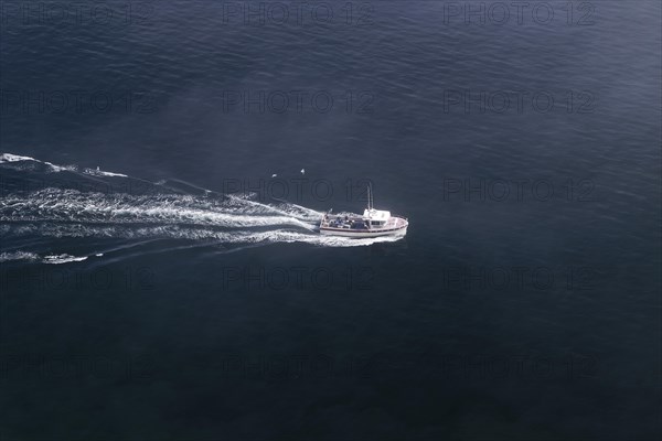 Coastal seascape, fishing boat in fog, Gulf of Saint Lawrence, Province of Quebec, Canada, sea, water, blue, North America