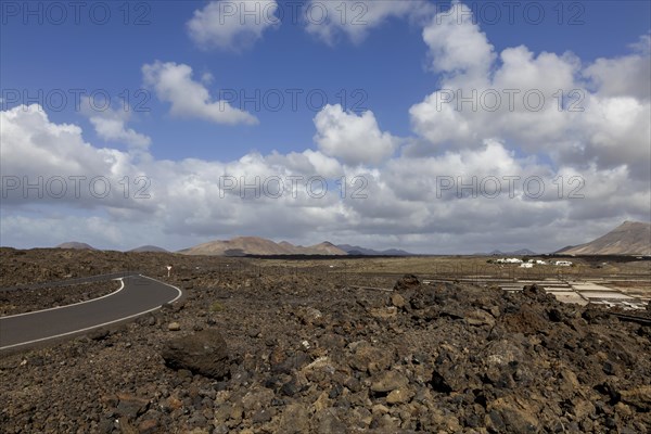 Road through lava fields, volcanic landscape, Lanzarote, Canary Islands, Canary Islands, Spain, Europe