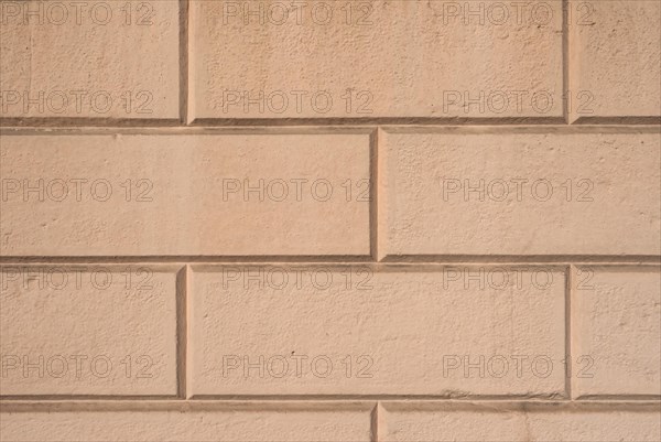 Brown ashlar wall texture background