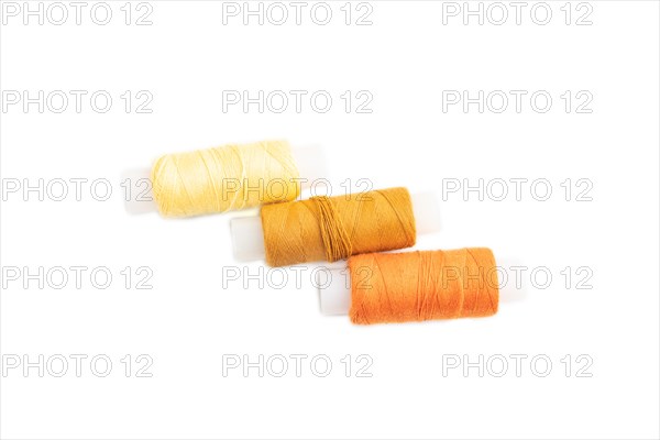 Spool of thread isolated on white background. Top view, flat lay, close up