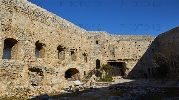 Walls of a historic fortress with arched windows under a clear sky, Chlemoutsi, High Medieval Crusader castle, Kyllini peninsula, Peloponnese, Greece, Europe