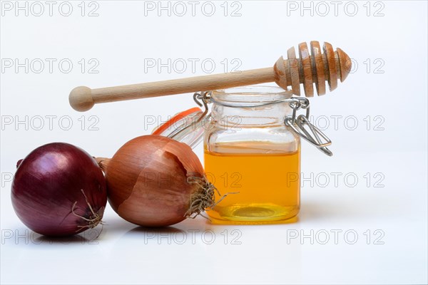 Honey in a jar and onions, ingredients for cough syrup