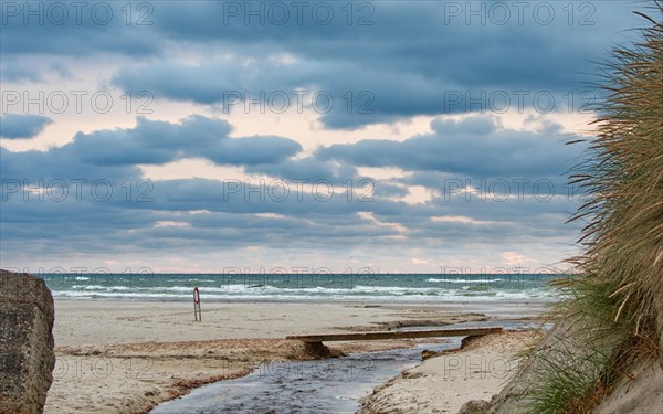 A small stream flows into the North Sea, Veiers Strand, West Jutland, Denmark, Europe