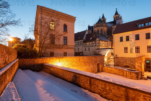 Historic courtyard of the Moellenvogtei, behind it half-timbered houses and cathedral at dusk, Magdeburg, Saxony-Anhalt, Germany, Europe