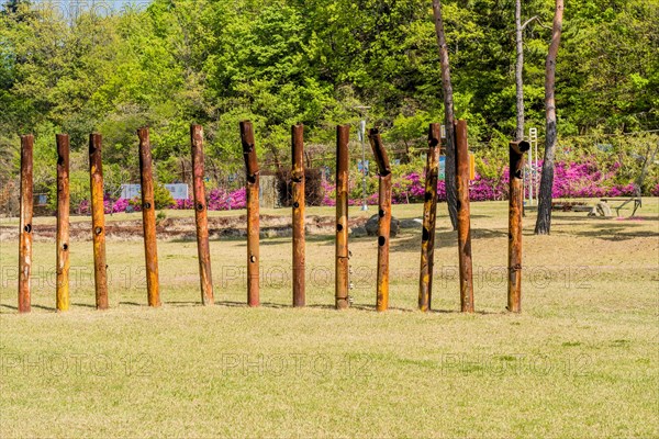 Sculpture: Row of large rusted metal pipes at at DMZ Peace Park. Artist unknown in Goseong, South Korea, Asia
