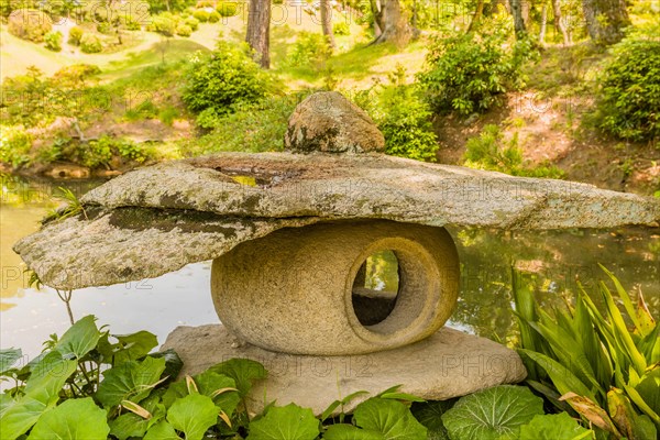 Stone carved lantern in Shukkeien gardens in Hiroshima, Japan, Asia