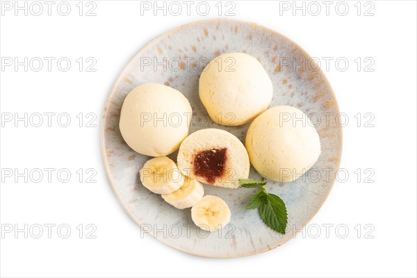 Japanese rice sweet buns mochi filled with jam isolated on white background. top view, flat lay, close up