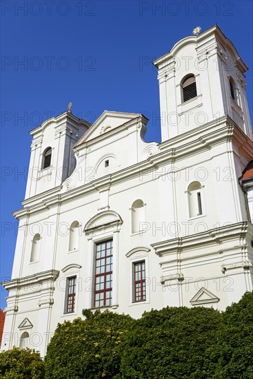 Baroque church with white facade and two towers against a clear blue sky, Roman Catholic Church of St Francis Xavier, Skalica, Skalica, Trnavsky kraj, Slovakia, Europe