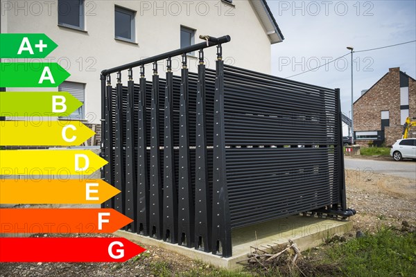 Absorber for the conversion of heat from the environment through sun, wind and ambient temperature. Transfer e.g. to a heat pump, diagram with energy efficiency classes for buildings according to the GEG, Duesseldorf, Germany, energy efficiency, Europe