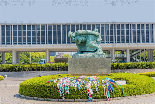 Statue of woman with children at entrance to Peace Memorial Park in Hiroshima, Japan, Asia