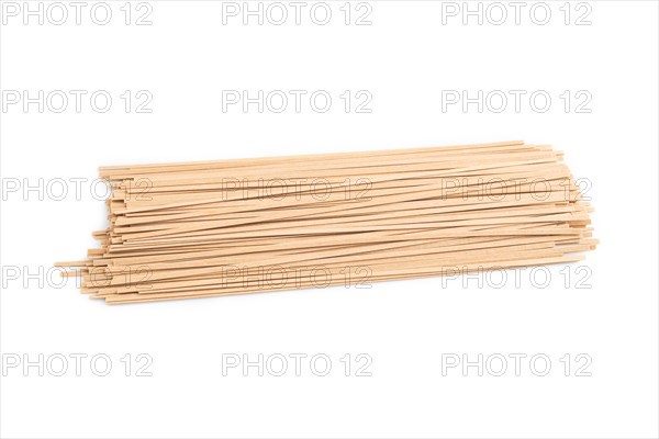Japanese buckwheat soba noodles isolated on white background. Side view, close up