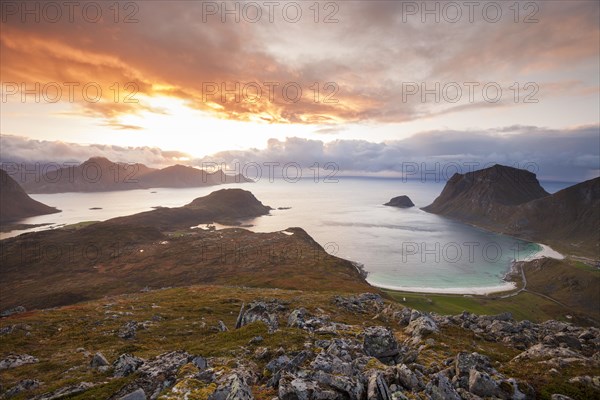 View of Haukland Beach from the summit of Holandsmelen, Lofoten. Dramatic sunset in autumn