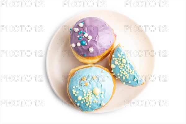Purple and blue glazed donut isolated on white background. top view, flat lay. Breakfast, morning, concept