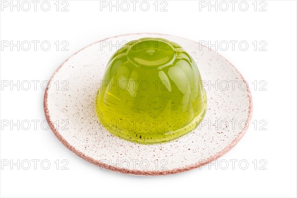 Mint green jelly isolated on white background. side view, close up