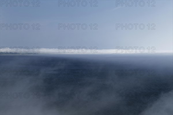 Coastal seascape in fog, Gulf of Saint Lawrence, Province of Quebec, Canada, sea, water, blue, North America