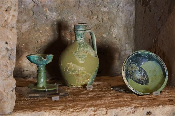 Ancient artefacts, including a vase and a bowl, displayed on a stone plinth, Museum, Chlemoutsi, High Medieval Crusader Castle, Kyllini Peninsula, Peloponnese, Greece, Europe