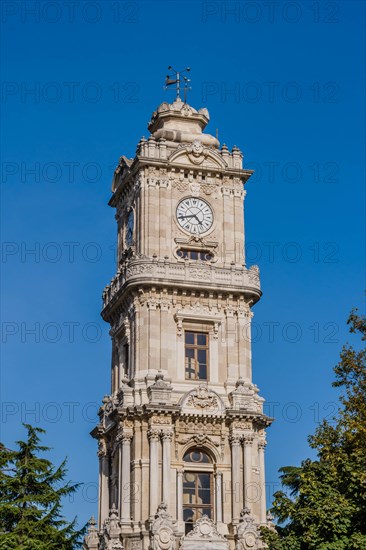 Four story clock tower in Istanbul park commissioned by Sultan Abdulhamid II in the early 19th century in Istanbul, Tuerkiye