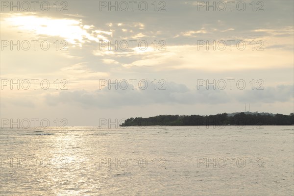 Lombok and Gili Air islands, overcast, cloudy day, sky and sea. Vacation, travel, tropics concept, no people. Sunset, sand beach