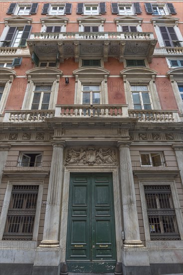 Palazzo Bendinelli Sauli, the coat of arms above the door are the symbols of the cities of Genoa and Turin, Via San Lorenzo, 42, Genoa, Italy, Europe
