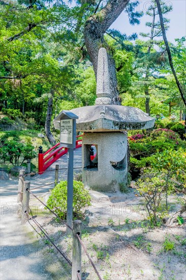 Large stone lantern in Shukkeien gardens in Hiroshima, Japan, Asia