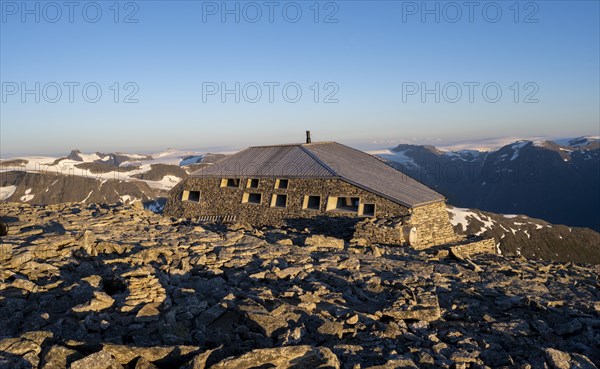 DNT's new mountain hut Skalatarnet, at the summit of Skala, at sunset, Loen, Norway, Europe