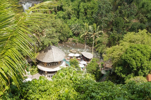 Tegenungan waterfall, Bali island, Ubud, Indonesia. Jungle, tropical forest, daytime with cloudy sky