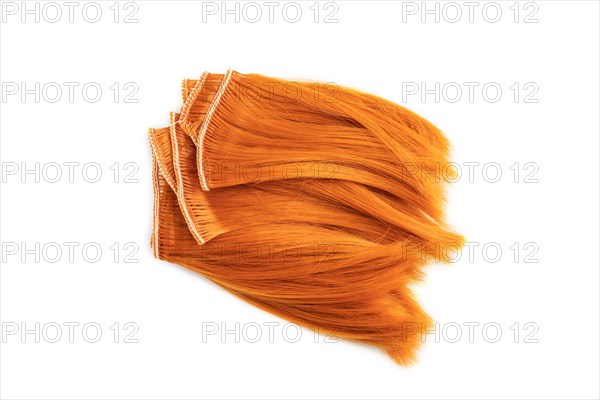 Orange braid isolated on white background. Top view, flat lay, close up